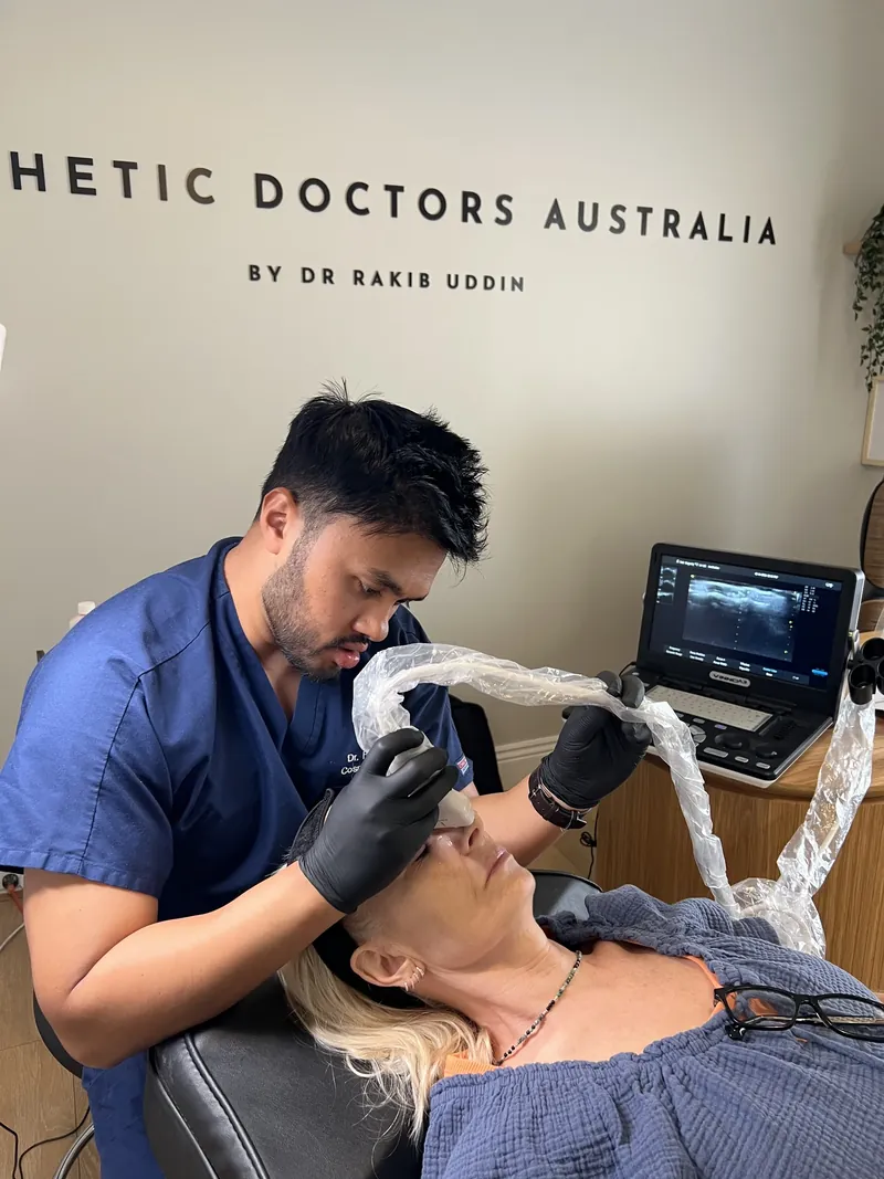 Dr Rakib Uddin performing an ultrasound-guided injectable treatment at Aesthetic Doctors Australia