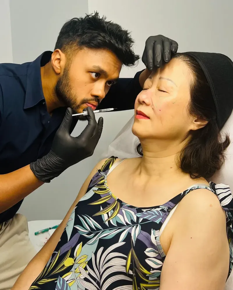 Dr Rakib performing volume enhancement injections at Aesthetic Doctors Australia by Dr Rakib in Kew, restoring facial fullness and contour with natural, balanced results.